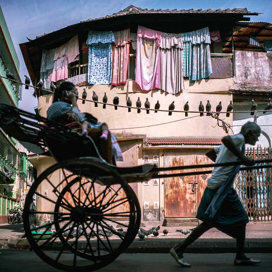 Tireur de pousse-pousse à Kolkata en Inde - Christophe MOEC